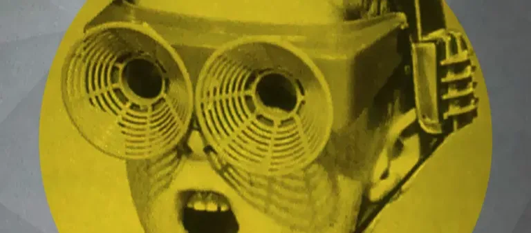 Titelbild des Podcasts Die digitale Zeit: ein gelb eingefärbter Maschinenkopf
